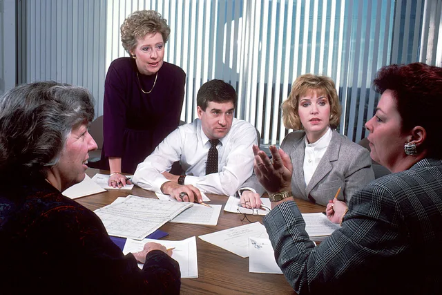 Title Staff Meeting Description A group of Caucasian people (4 females and 1 male) sit around an office conference table discussing a manuscript. Topics/Categories People -- Adult People -- Group People -- Health Professional Type Color, Photo Source National Cancer Institute. Seven sign-off checks for professional services marketing cost